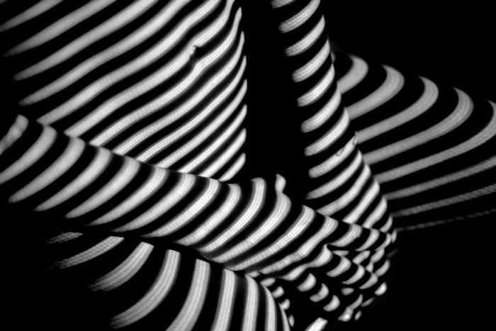 Abstract body photography using artistic shadows and light