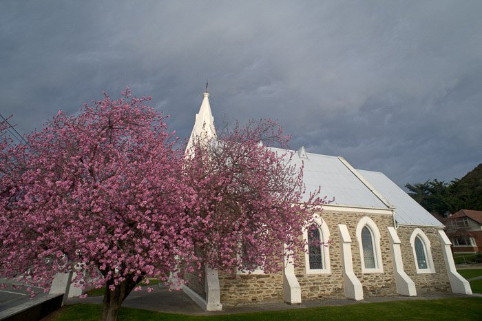 A stone church on an overcast day - nikon prime lenses