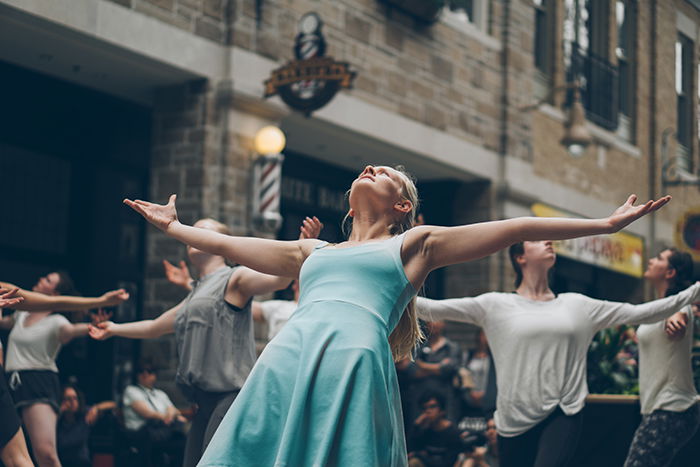 A A candid photography example of of street dancers performing 