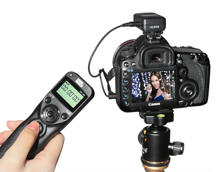 A remote trigger beside a DSLR camera - photo booth ideas