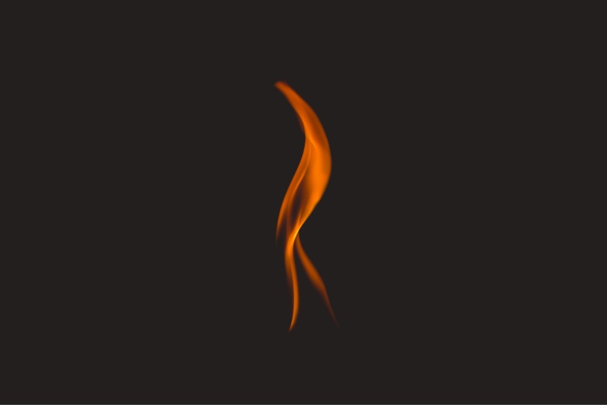 A red flame with a black background for fire photography
