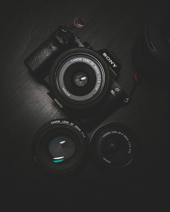 A Sony DSLR camera resting on a table