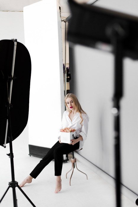 A female model in a photography studio- photography internships