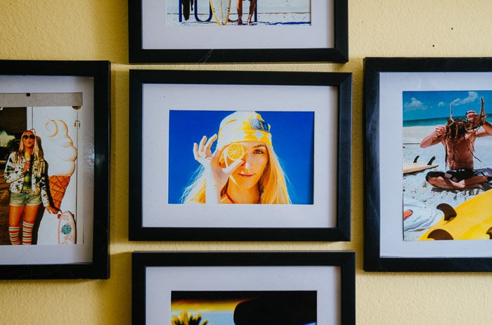 A selkection of framed iphone prints on a wall