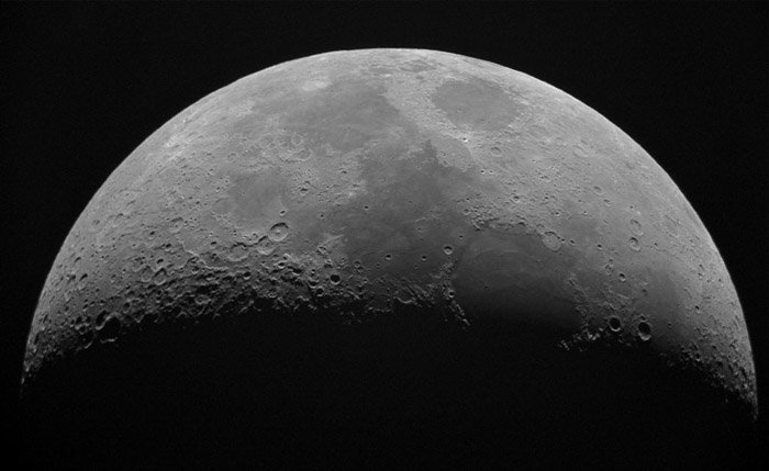 A close up photo of the moon shot with a telephoto lens