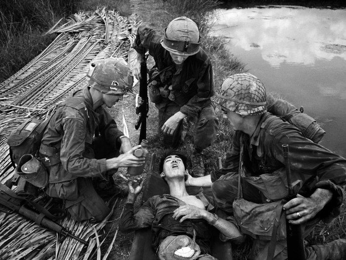 A black and white war photography shot by Philip Jones-Griffiths