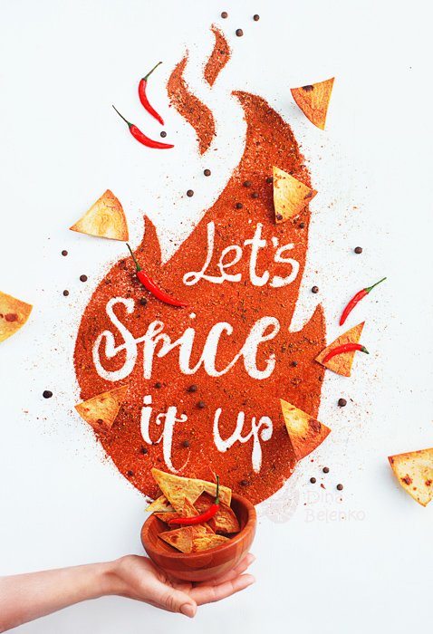 A creative still life using food typography made from tortilla chips and spices - examples of typography