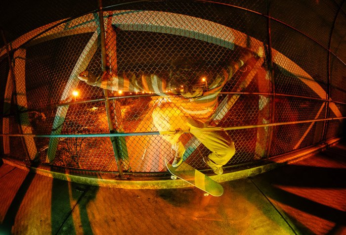 A portrait of a skateboarder shot using perspective distortion