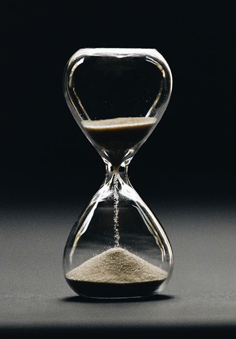 Atmospheric photo of an hourglass - conceptual photo ideas 