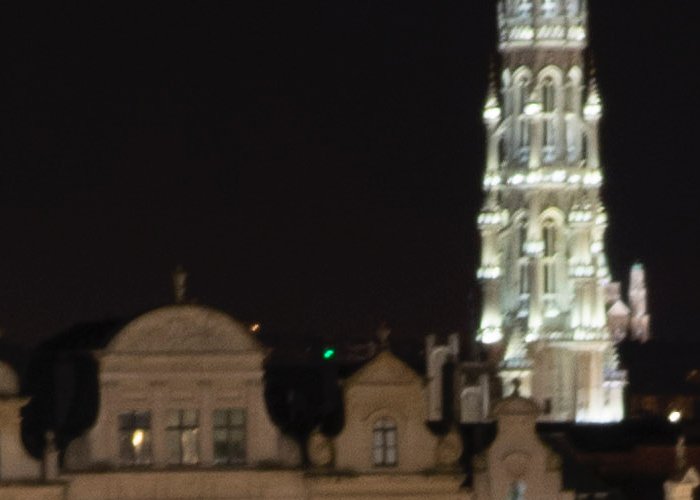 An architecture photographed at night, blurry due to camera motion blur