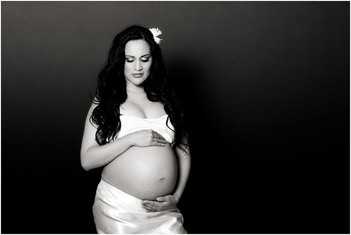 A beautiful black and white maternity portrait shot in a studio - people photography
