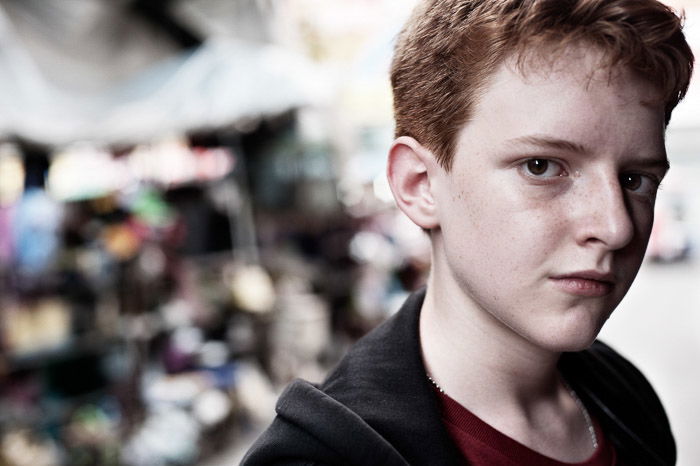 A portrait of a young boy indoors