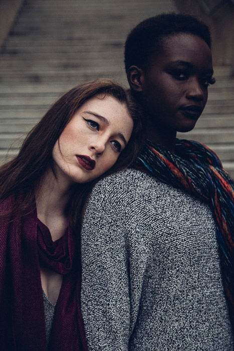 A portarit of two female models posing 