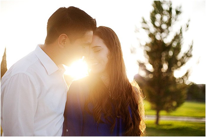 A dreamy portrait of a couple posing outdoors - people photography tips