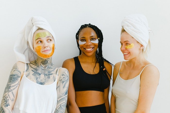 Three women wearing face masks for a lifestyle portrait