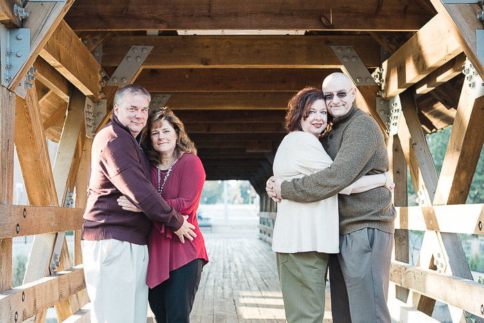 two couple posing for a family photography shoot