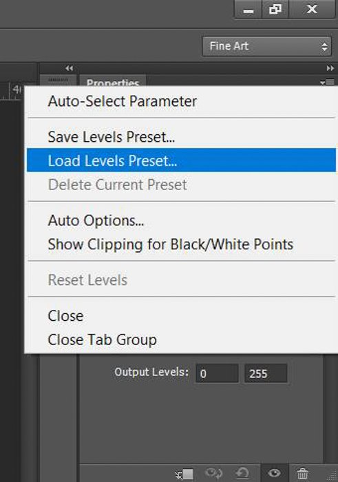 A screenshot showing how to do color correction in Photoshop with a grey card - load levels preset