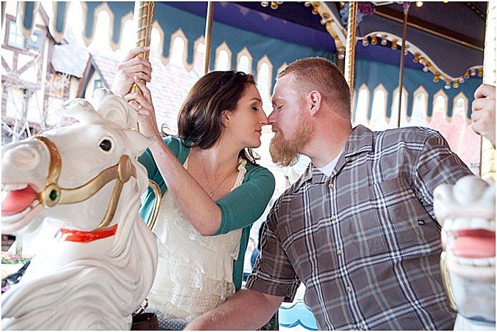 A romantic portrait of a couple on a carousel ride - emotional photography