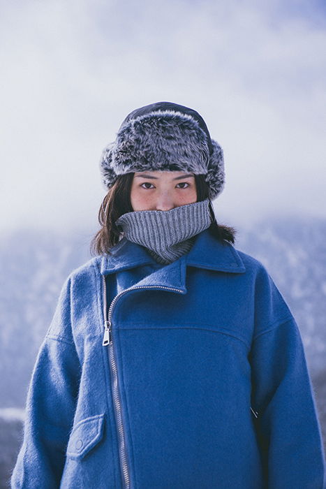 A female model posing for a winter portrait