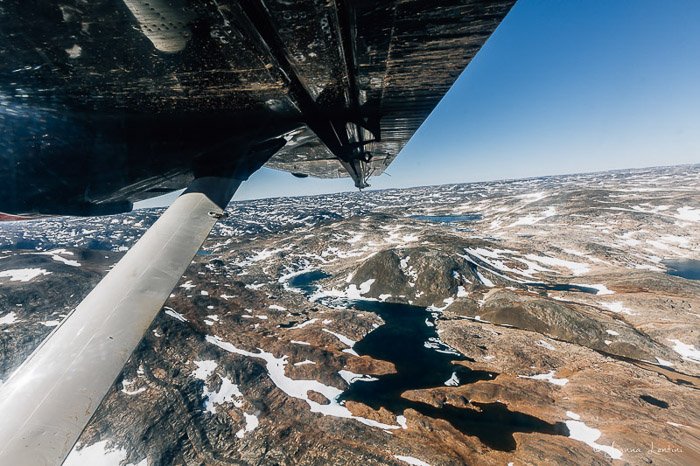 Stunning aerial view of a landscape shot from an airplane - adventure photography gear
