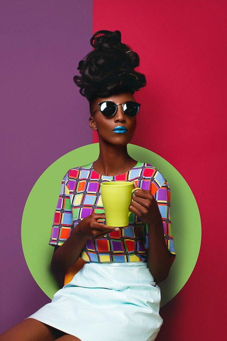 A brightly colored fashion shoot setup for a portrait of a female model by Victor Peace