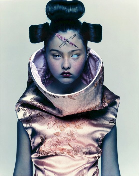 A surreal portrait of a female fashion model as a futuristic geisha by Nick Knight