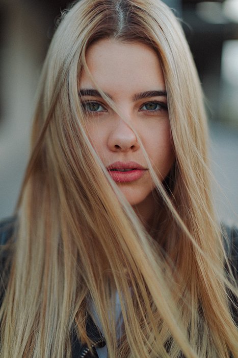 A stunning portrait of a blond female model - female face portrait