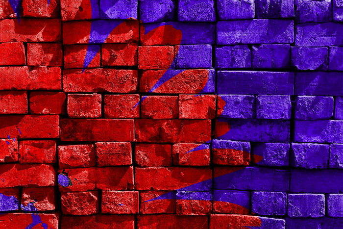 Colorful painted red and white bricks as an example of analogous colors in photography