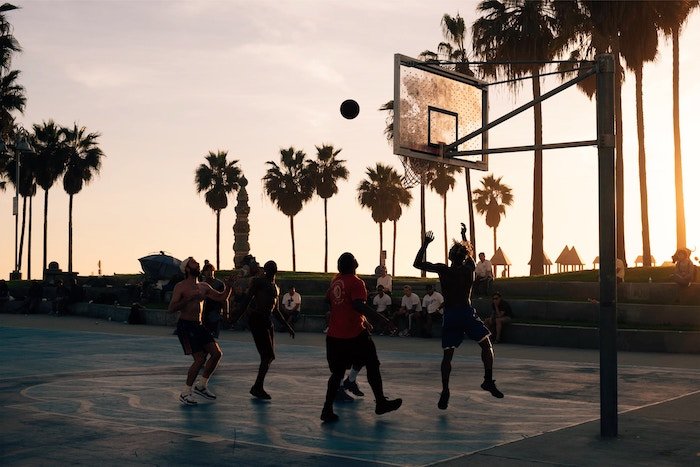 An outdoor basketball game in low light - cool basketball pictures