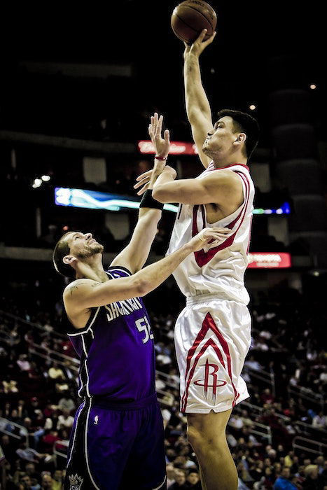 Cool basketball photography close up of two players mid match