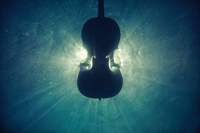 Atmospheric photo of a cello underwater - beautiful photography principles