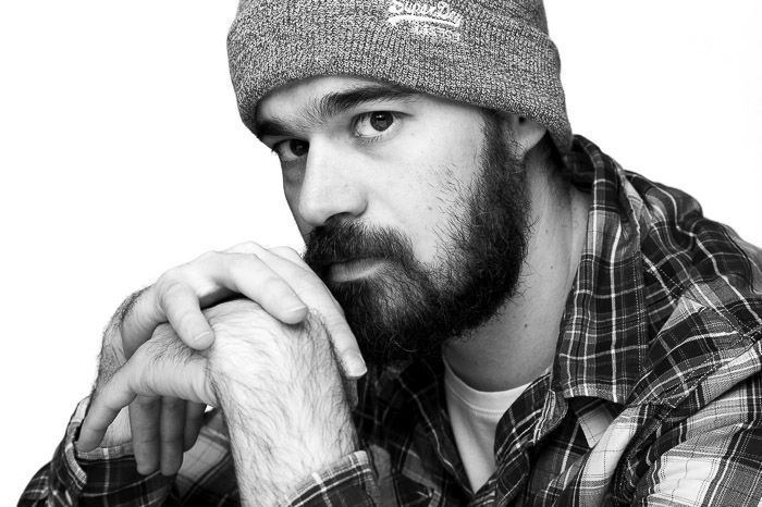 Studio portrait of a male model shot with broad lighting techniques