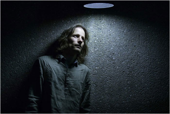 Studio portrait of a male model shot with broad lighting techniques