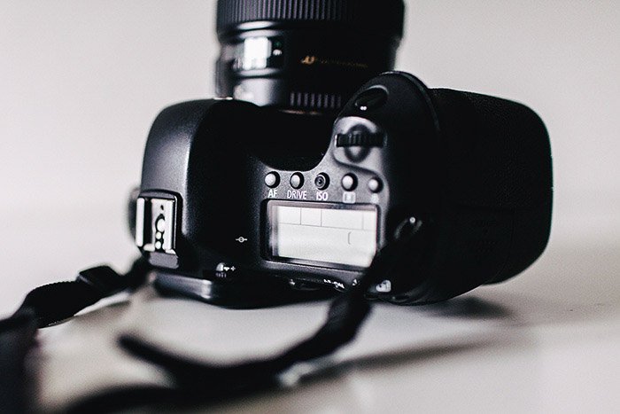 A DSLR camera on its side - burst mode photography