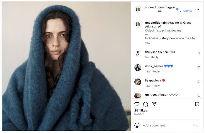 Screenshot of an Alexandra Nataf Instagram post of a model covered in a large, fleece-looking coat