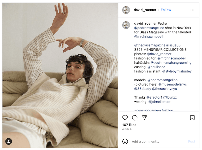 Screenshot of a David Roemer Instagram post of a model in casual wear lying back on a couch