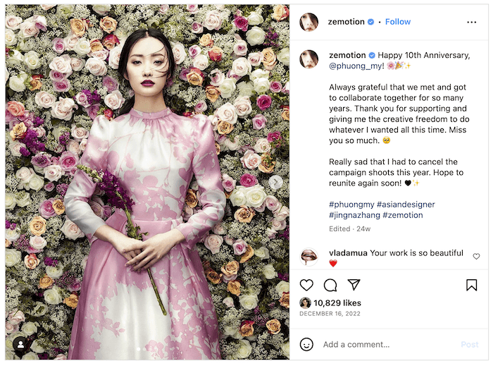 Screenshot of a Zhang Jingna Instagram post of a fashion model in front of a wall of flowers