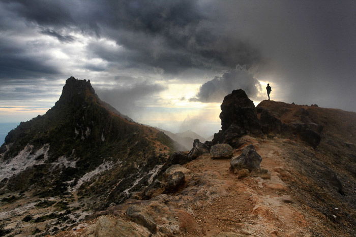 A stunning volcanic landscape under cloudy sky