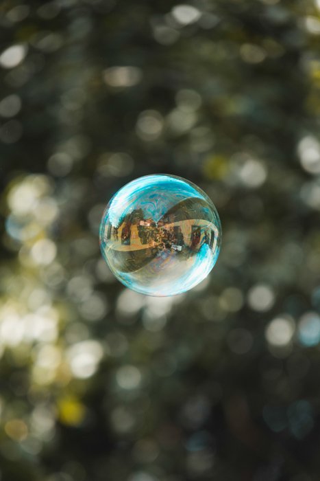 dreamy photo of a reflection in a soap bubble on a sunny day 