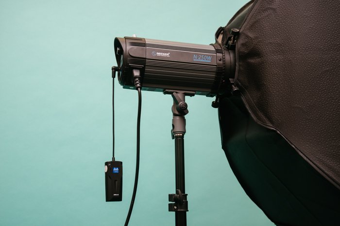 A light source with umbrella for the 3 point lighting setup