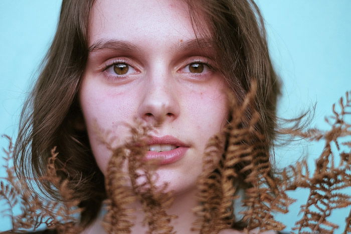 A stunning portrait of a female model featuring stunning catchlight in the eyes