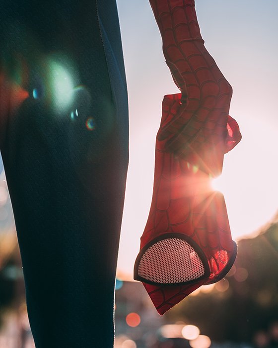 Atmspheric osplay photography of a person dressed as spiderman