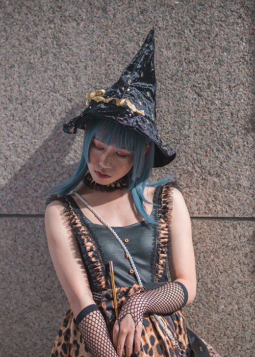 Cosplay photography of a female model dressed as a witch fairy