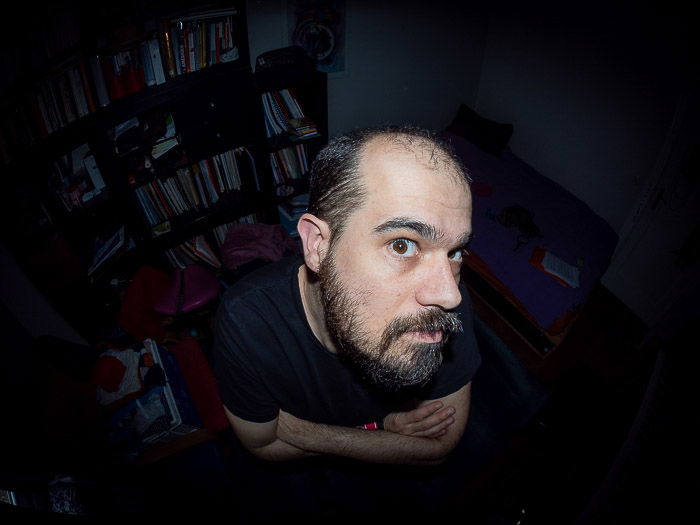 Overhead portrait of a man taken with a fisheye lens