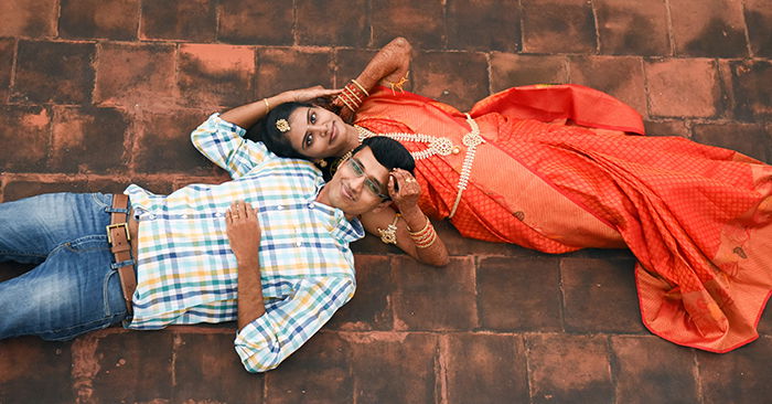 Young Happy Indian Couple Posing With Elephant Stock Photo by ©eugenef  69447141