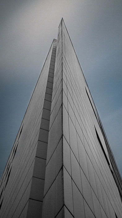 An image of a skyscraper being edited using lightroom auto mask