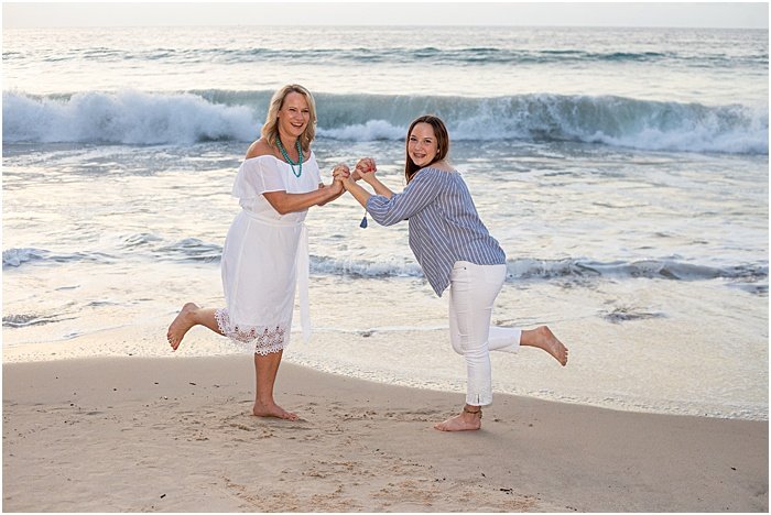 Sweet portrait of a mother and daughter on the beach - mother daughter photoshoot