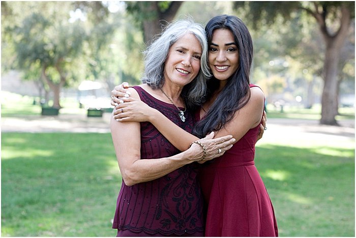 A mother daughter photoshoot outdoors in a park