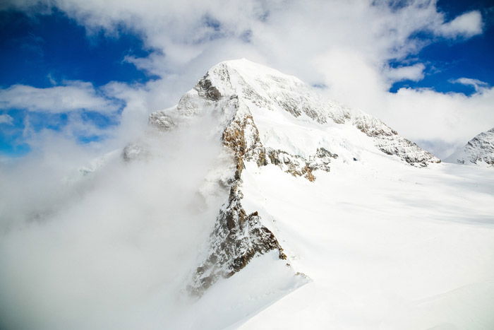 a beautiful mountainous landscape in the snow - stunning landscape photos 