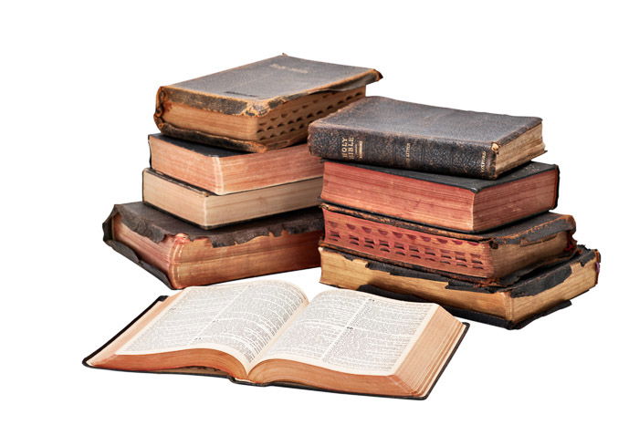  Old books isolated on white background shot with softbox lighting